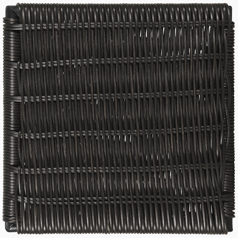 Close-up of black woven rattan texture.