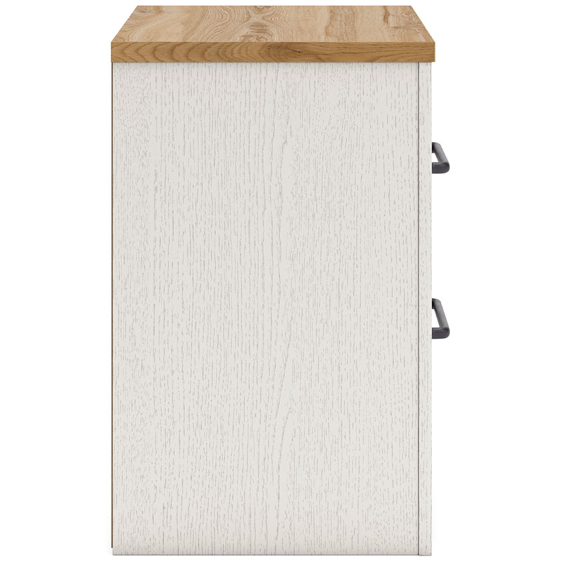 Side view of a white wood nightstand with a wood top.