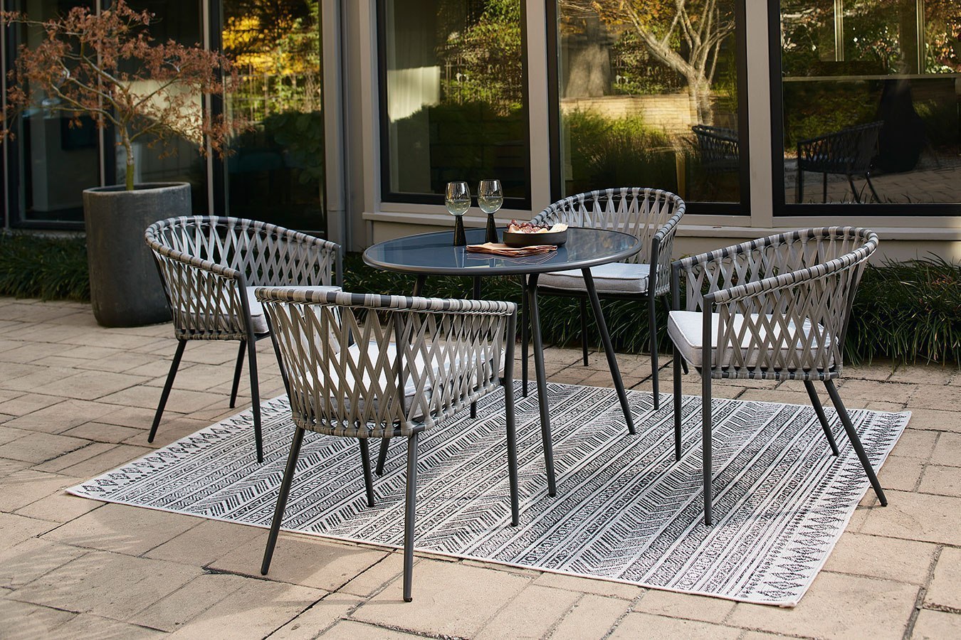 Palm Bliss Outdoor Dining Set Signature Design | Furniture Cart