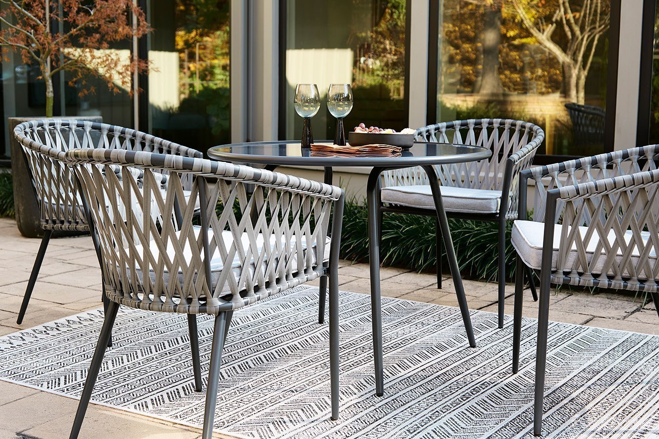Palm Bliss Outdoor Dining Set Signature Design | Furniture Cart