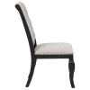 Phelps Distressed Noir and Tan Dining Room Set