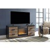 Harlinton Large TV Stand w/ Glass and Stone Fireplace