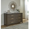 Brillynd Burnished Brown Upholstered Panel Bedroom Set