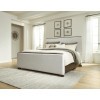 Brillynd Burnished Brown Upholstered Panel Bed